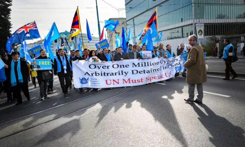 Uyghurs and Tibetans demonstrate against China outside of the United Nations (UN) offices during the Universal Periodic Review of China by the UN Human Rights Council in Geneva on Nov. 6, 2018. (FABRICE COFFRINI/AFP/Getty Images)