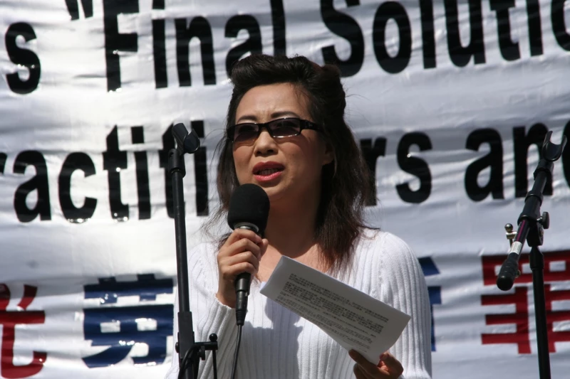Annie (alias), ex-wife of a brain surgeon who removed organs from thousands of Falun Dafa prisoners of conscience in China in the early 2000s, speaks at a press conference in Washington, D.C., on April 20, 2006. (The Epoch Times)